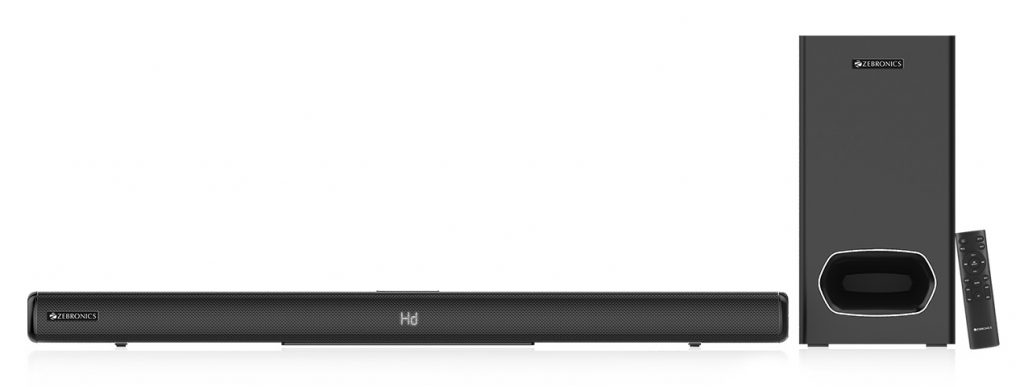 Zebronics has announced its latest premium soundbar in India called ZEB-Juke Bar 9000 Pro. The packaging includes soundbar itself and subwoofer, both delivering 60Watts RMS output power. The soundbar sports a sleek design and is loaded with Dolby Digital Plus for immersive audio experience. It uses Bluetooth V4.2 for wireless playback of music via smartphones. Apart from Bluetooth, there are multiple connectivity modes like USB, AUX, HDMI (ARC) and optic. Notably, this multi-driver soundbar delivers more accurate positional accuracy for superior gameplay experience. The Zebronis ZEB-Juke Bar 9000 Pro features in quad 7cms drivers and dual 2.5cms tweeters for best audio experience. The high and mid range frequencies are handled by soundbar while the lower frequency are handled by subwoofer. Zebronics ZEB-Juke Bar 9000 Pro photo -2 Zebronics ZEB-Juke Bar 9000 Pro specifications Dimensions / Weight: Soundbar: 900 x 118 x 67 mm / 2.7 Kg Subwoofer: 170 x 306 x 380 mm / 4.3 Kg Packaging: 974 x 230 x 451 mm / 7 Kg Output Power (RMS): Soundbar: 60 Watts Subwoofer: 60 Watts Total: 120 Watts Driver Size: Soundbar: 6.98cm (2.75″) x 4 + 2.54cm (1″) x 2 Subwoofer: 16.51cm (6.5″) x 1 Impedance: Soundbar: 4Ω + 5Ω Subwoofer: 4Ω Frequency Response: 45Hz – 20kHz S/N Ratio: ≥ 66dB Separation: ≥ 42dB Line Input: 3.5mm, Optical IN, HDMI (ARC) Max Supported memory: 32GB Bluetooth Version: V4.2 The Zebronics ZEB-Juke Bar 9000 Pro soundbar price is Rs. 26,999 (US$ 379 approx.) and is already available in India.